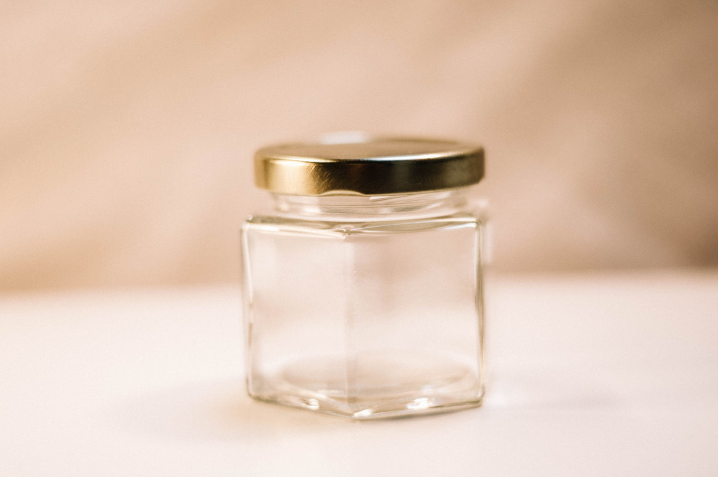Clear 4oz Jar Hex Gold Lid